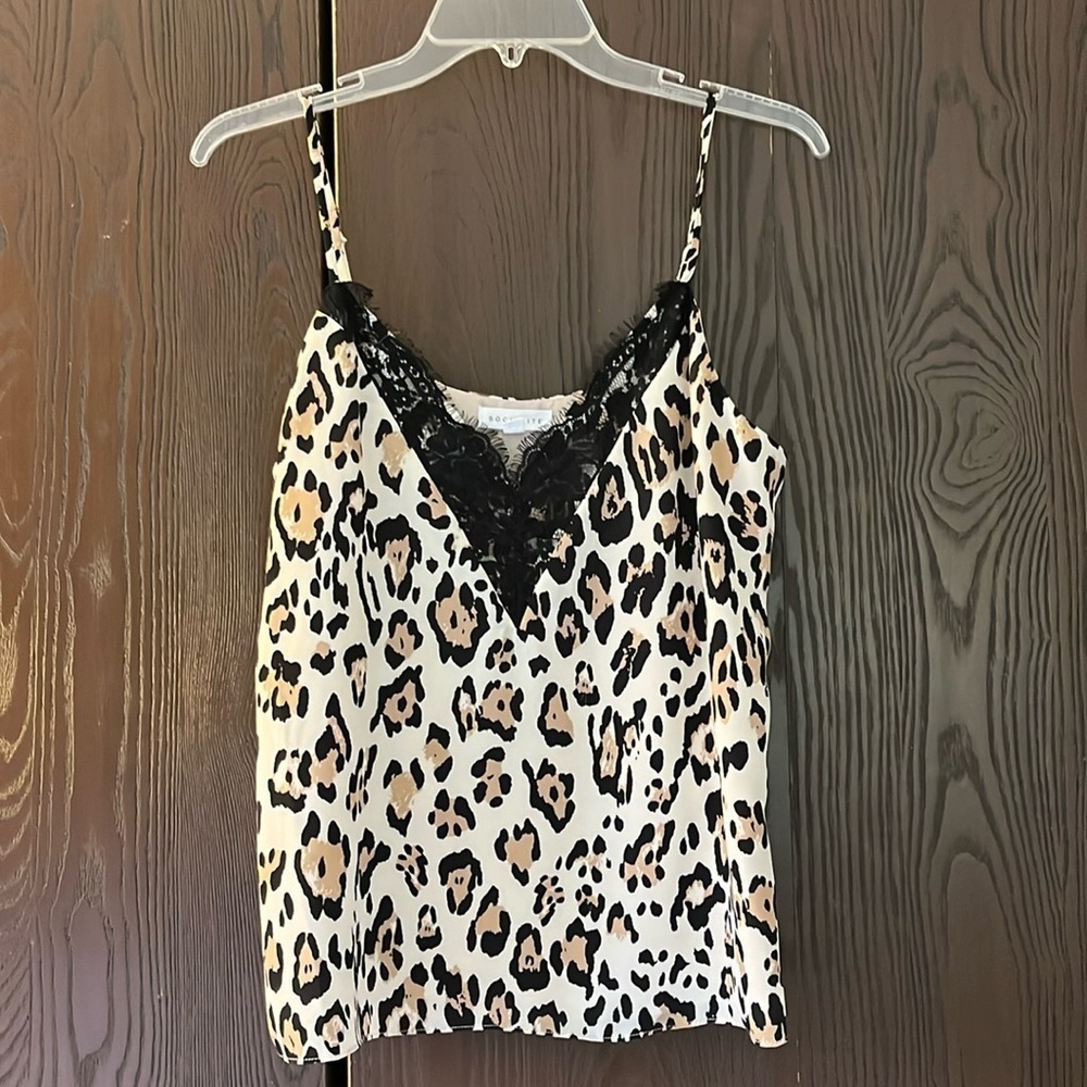 Socialite spaghetti strapped silky feel camisole. Cream with animal print. Med